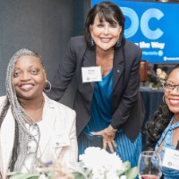 President Mantella smiles with 2 GVSU Alumnae